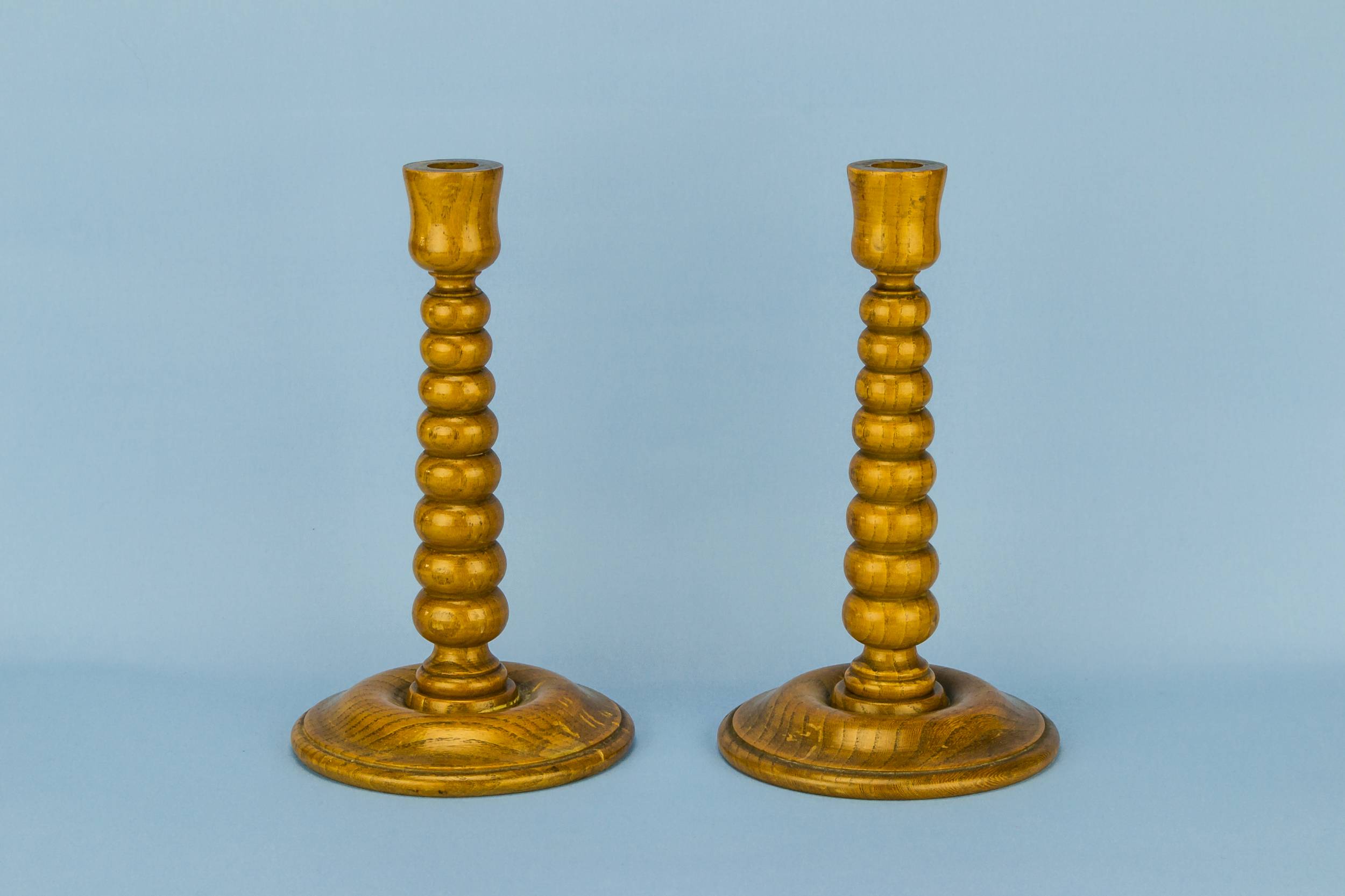 Arts Crafts Antique — 2 blonde bobbin candlesticks