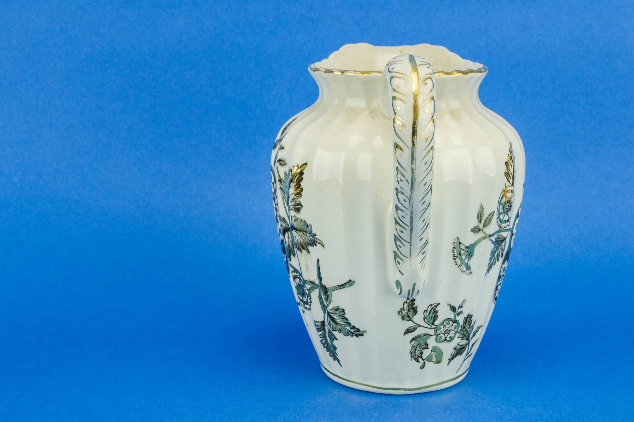 Elegant Antique S — Gilded flower jug 1