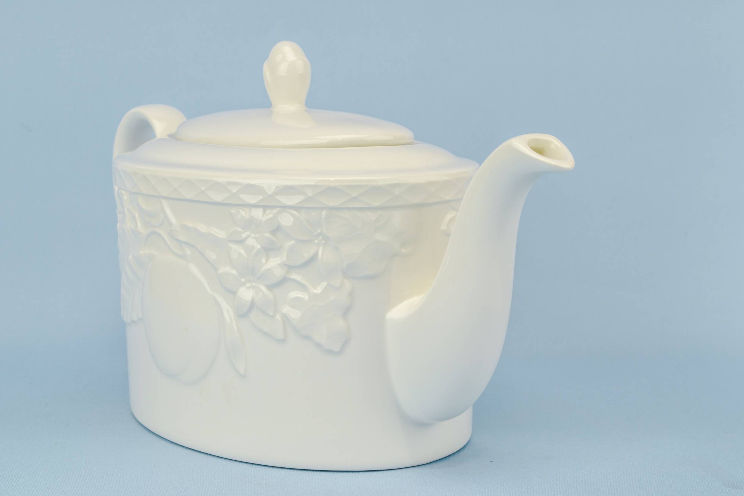 Porcelain Vintage TEAPOT — Moulded white teapot 2