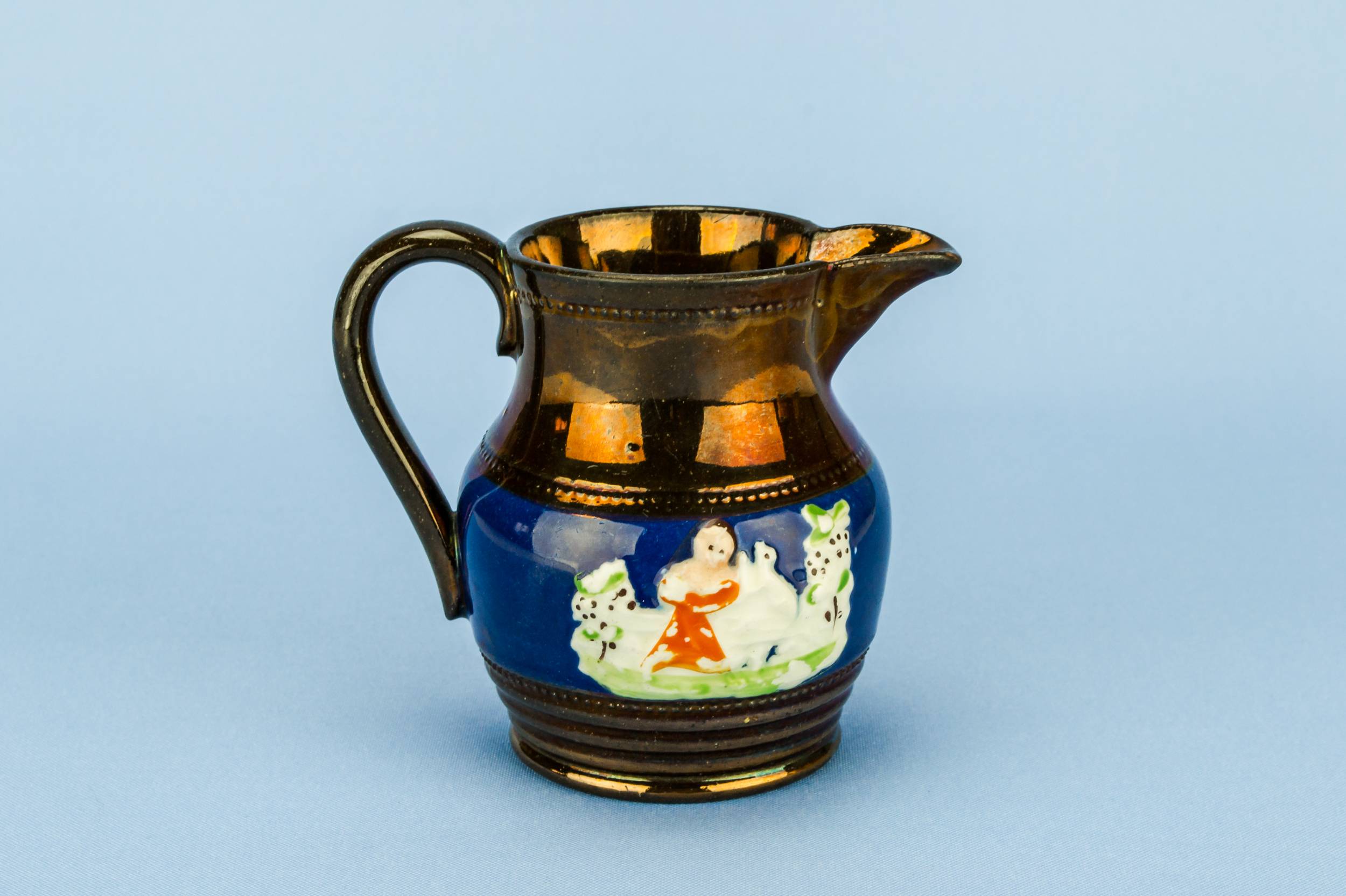 Late Georgian Ceramic — Small lustre milk jug