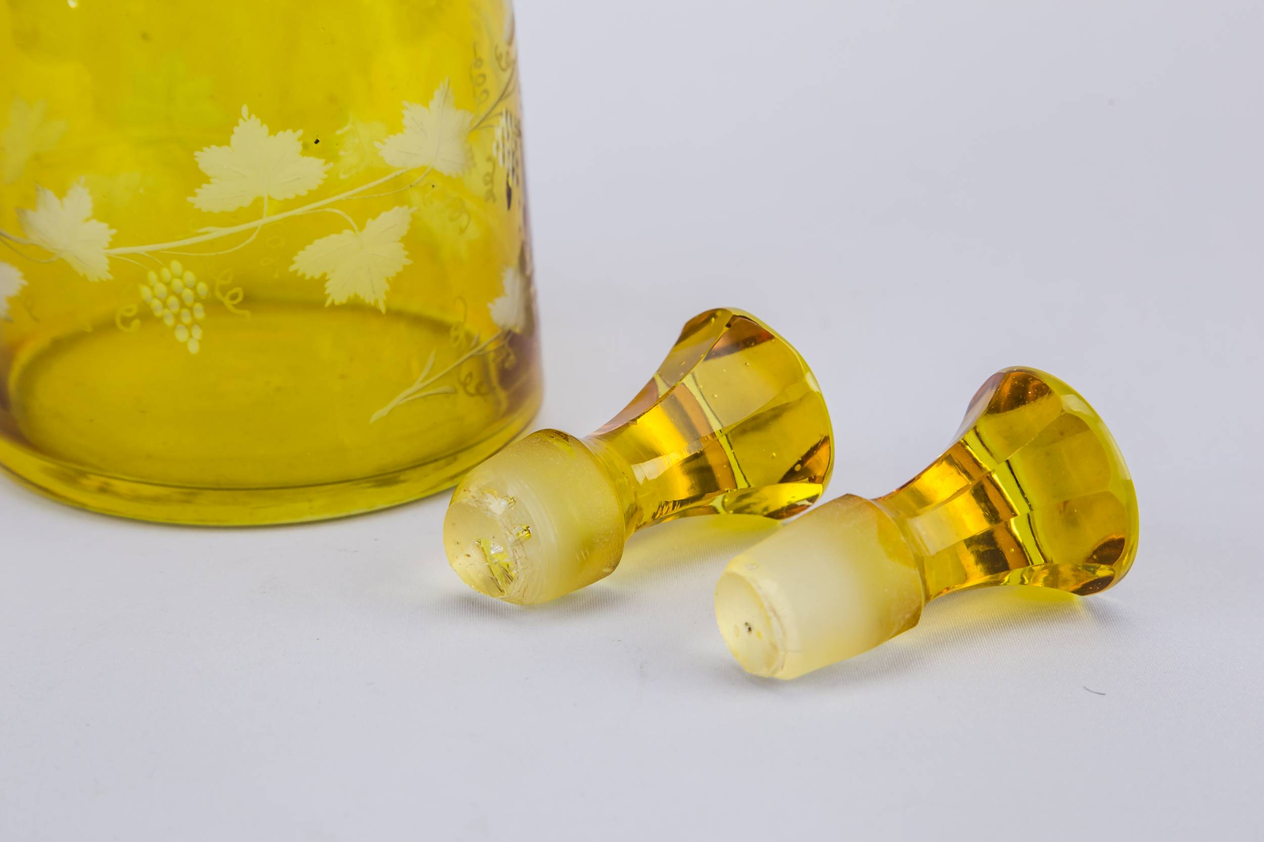 Tapered Wine Bottles — 2 yellow glass wine bottles 2