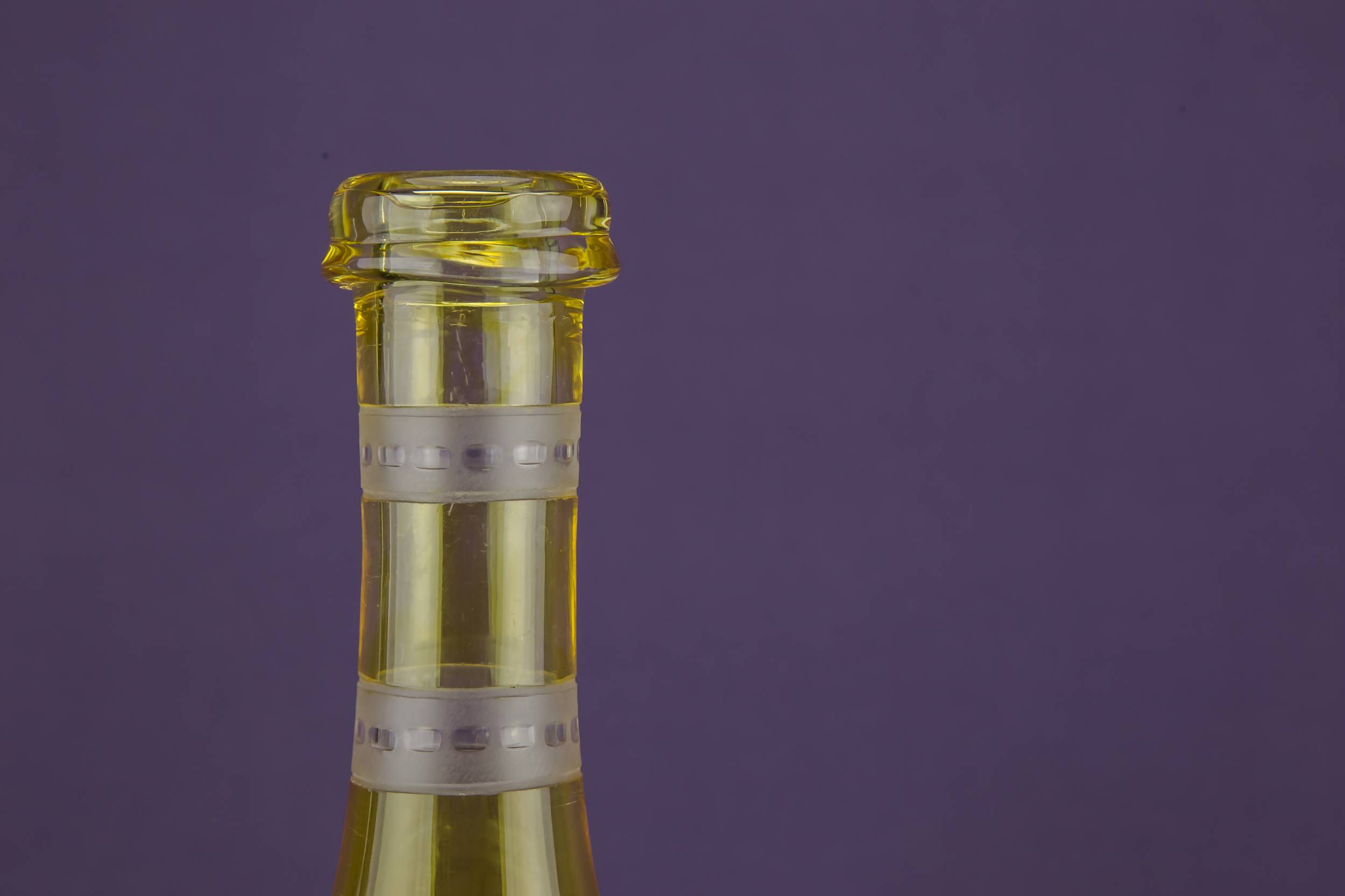 Yellow Engraved Glass — 2 yellow glass wine bottles 1