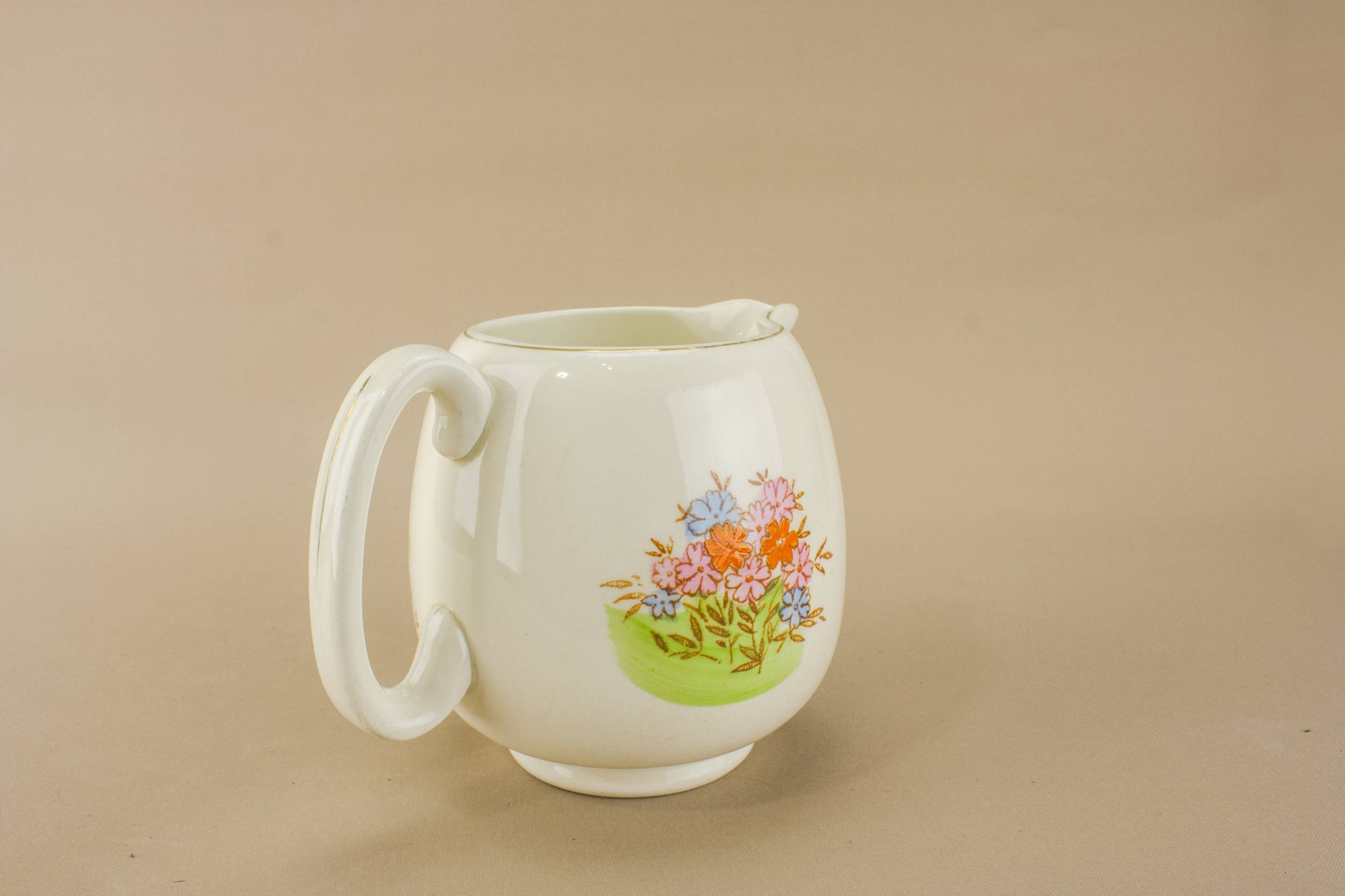Three Spectacular Art — Three yellow pottery jugs 1