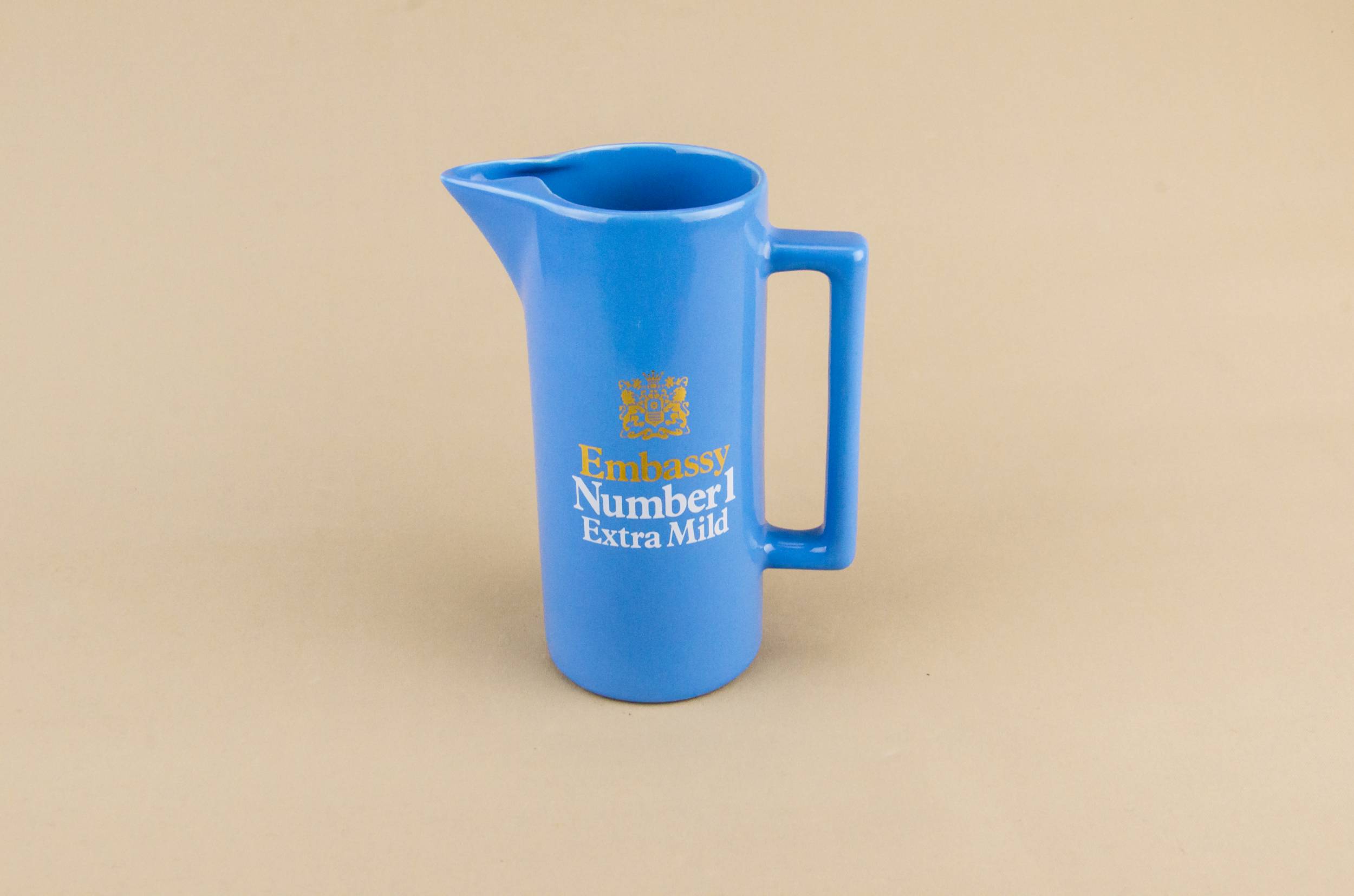 Advertising Pottery Embassy — Blue water jug