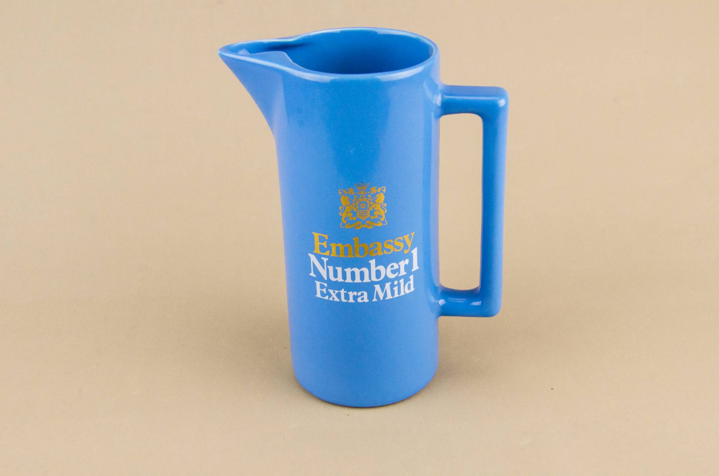Advertising Pottery Embassy — Blue water jug 1