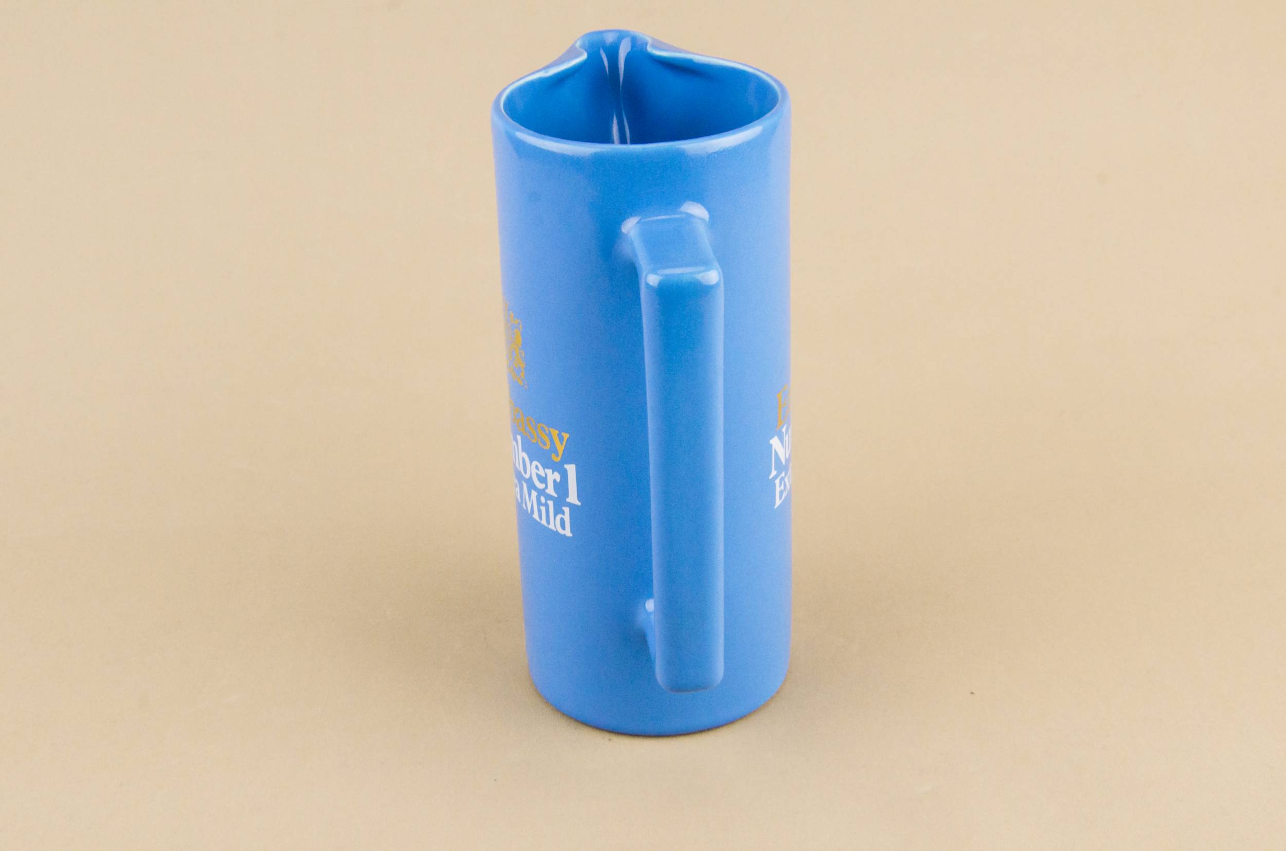 Advertising Pottery Embassy — Blue water jug 2