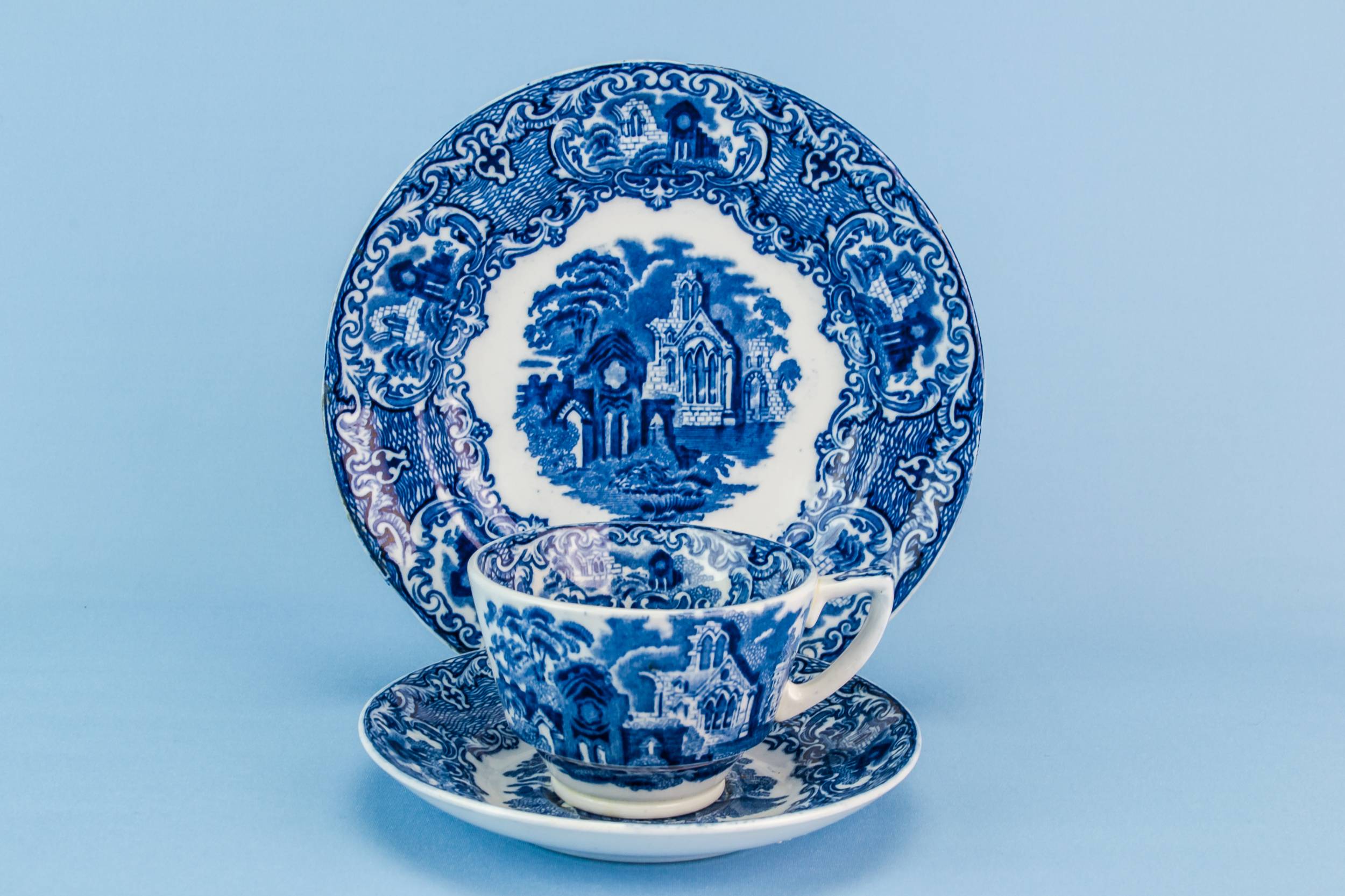 Elegant Pottery Saucer — Blue and white tea set