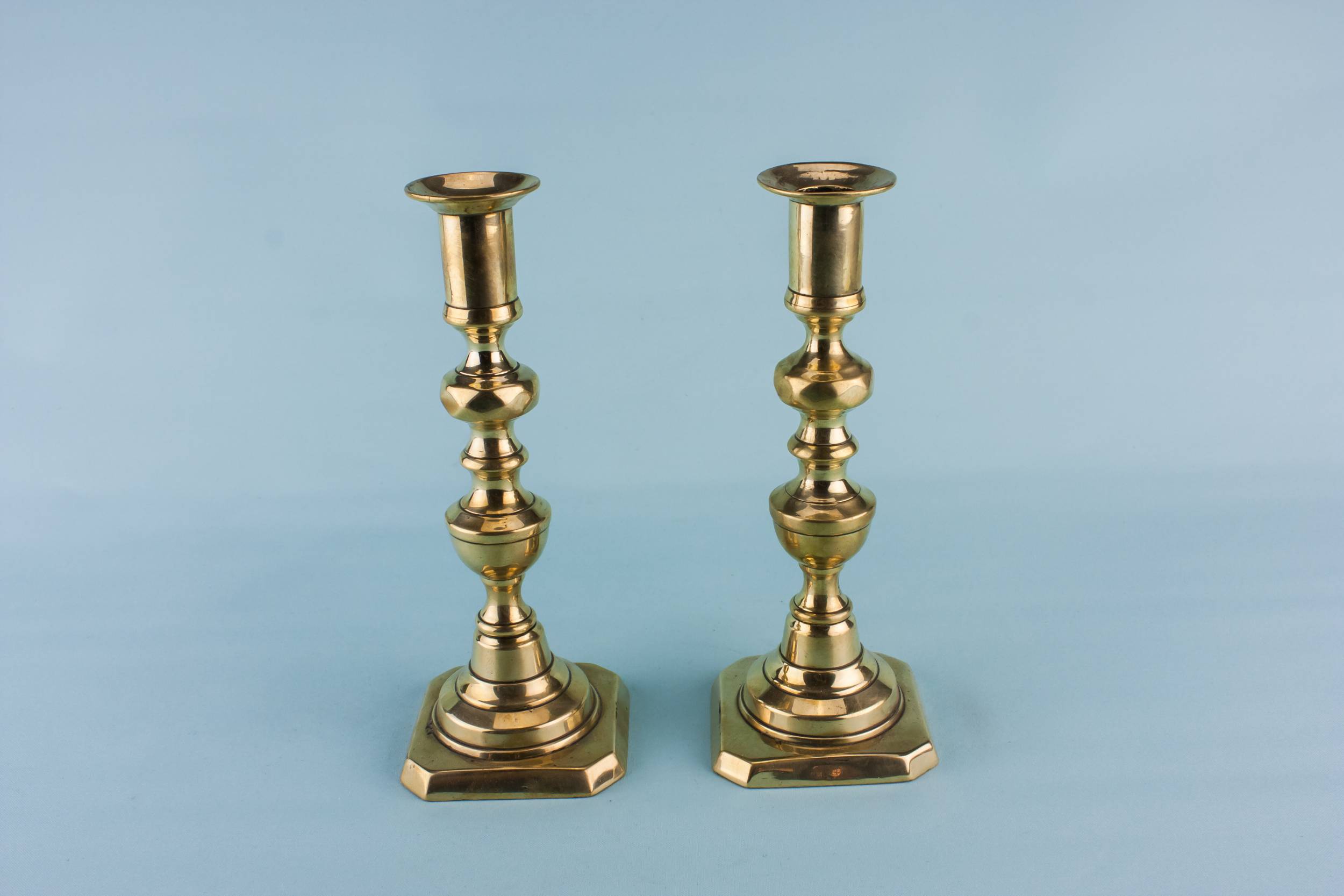 Antique Brass Decor — Pair of brass candlesticks