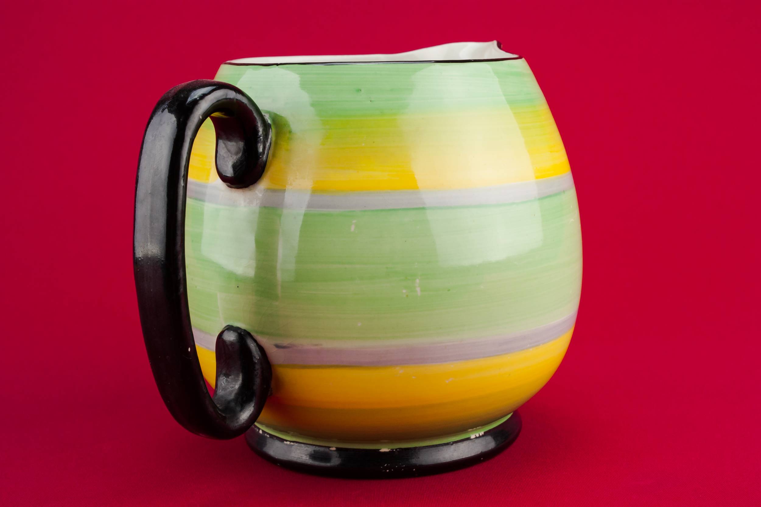 Yellow Slick Pottery — Yellow pottery creamer 1