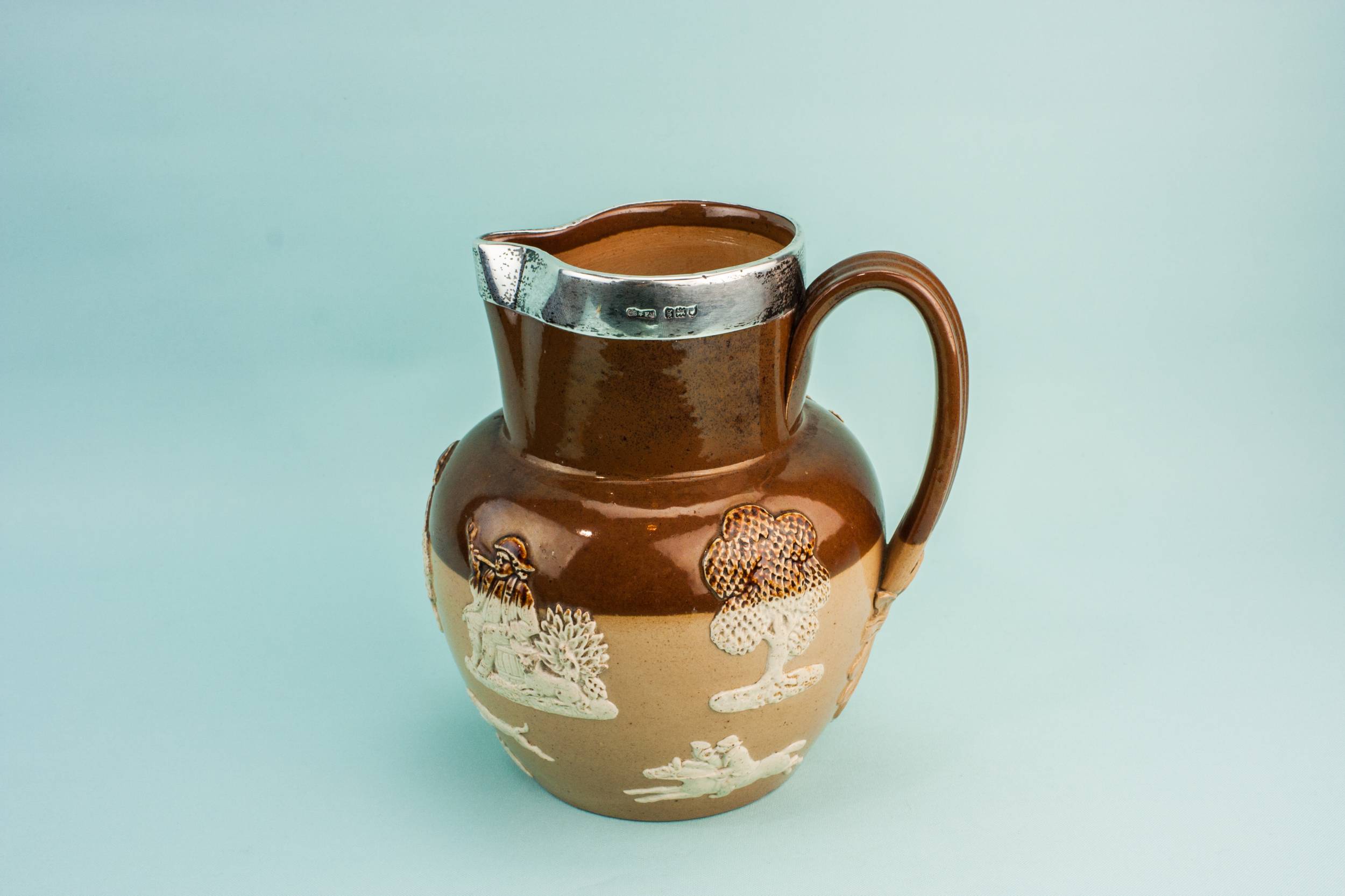 Sterling Silver Antique — Silver rimmed water jug