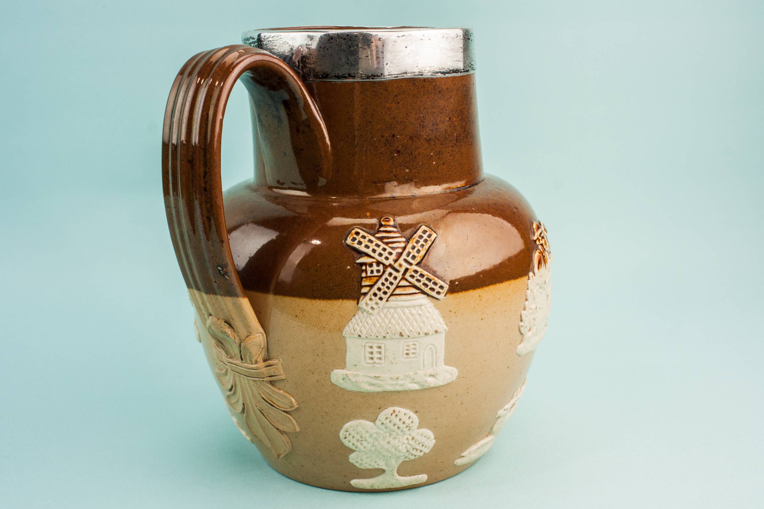 Sterling Silver Antique — Silver rimmed water jug 1
