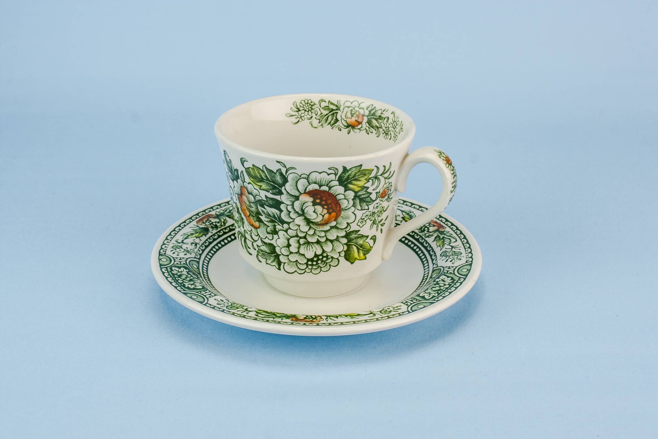 Pottery Modernist Cup — Green teacup and saucer