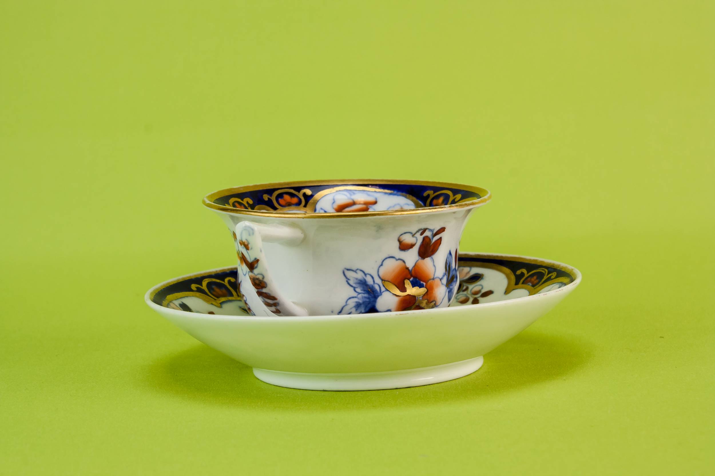 Antique Pottery Cup — Floral teacup & saucer 1