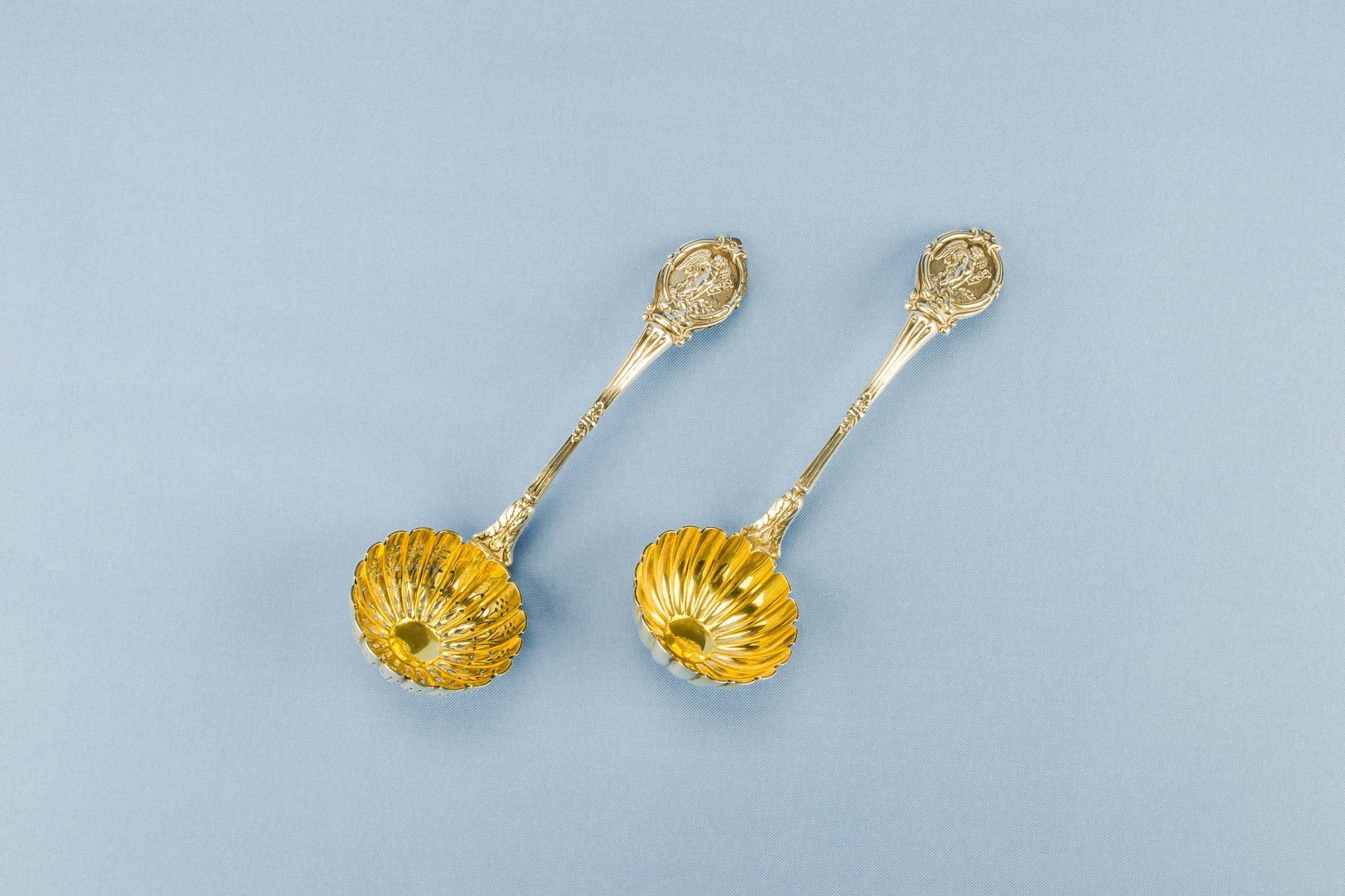 Silver Plated and — 2 dessert serving spoons