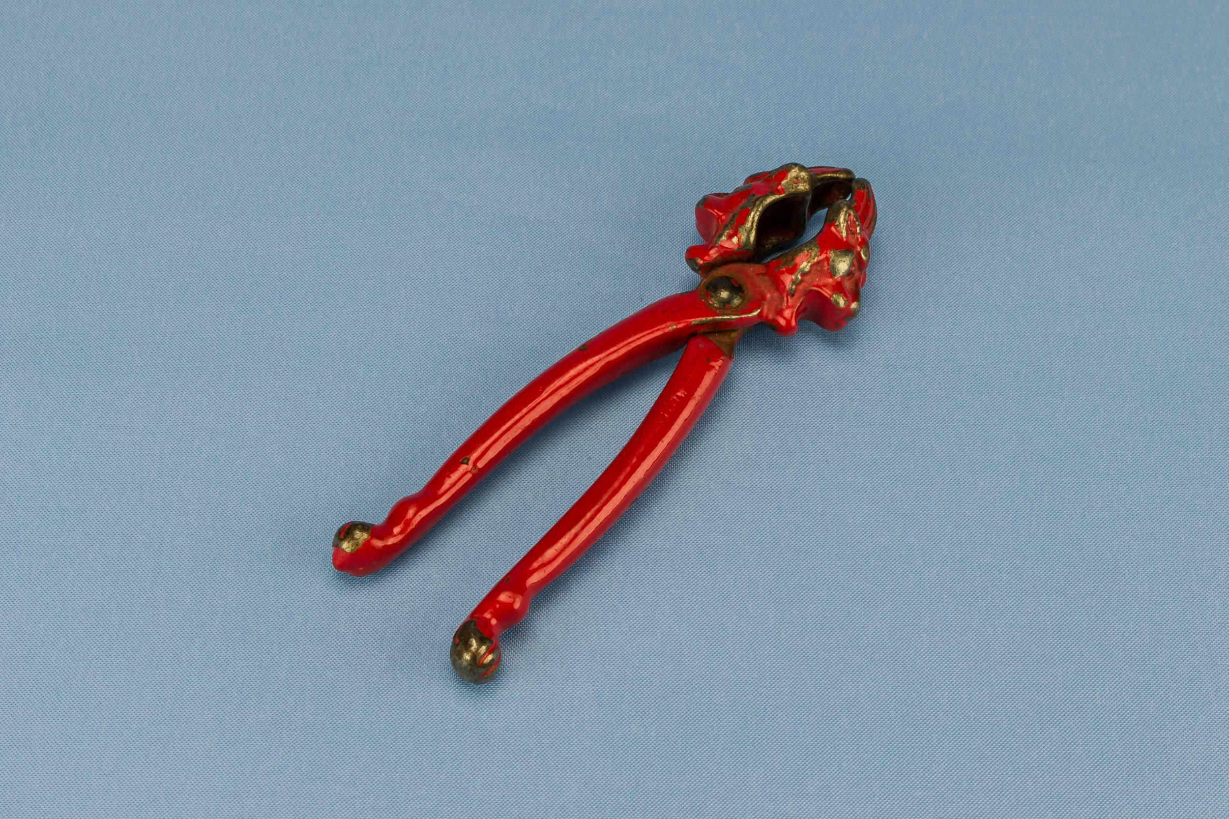 Red Attractive Metal — Red tiger nut cracker