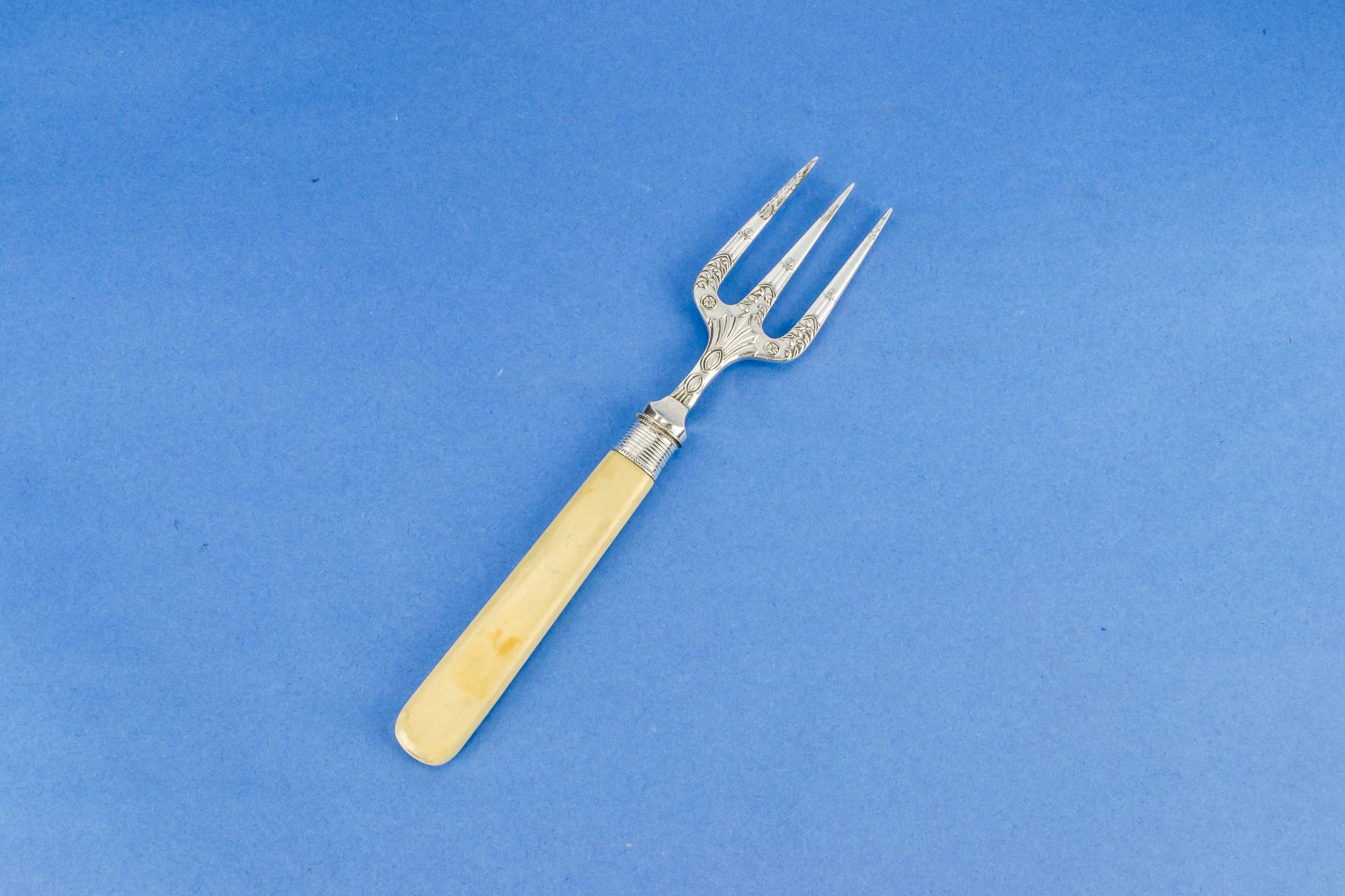 Silver Aesthetic Movement — Ornate serving fork